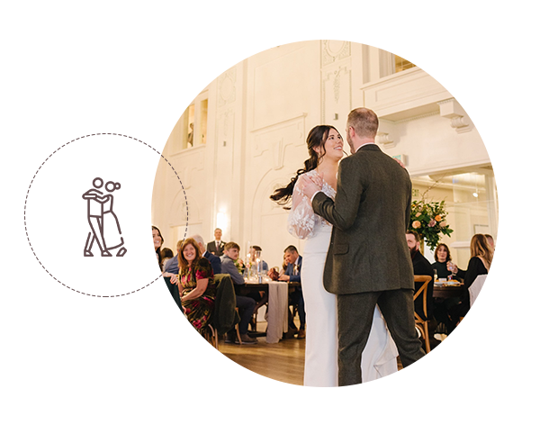 Lively dance floor with guests enjoying the wedding reception